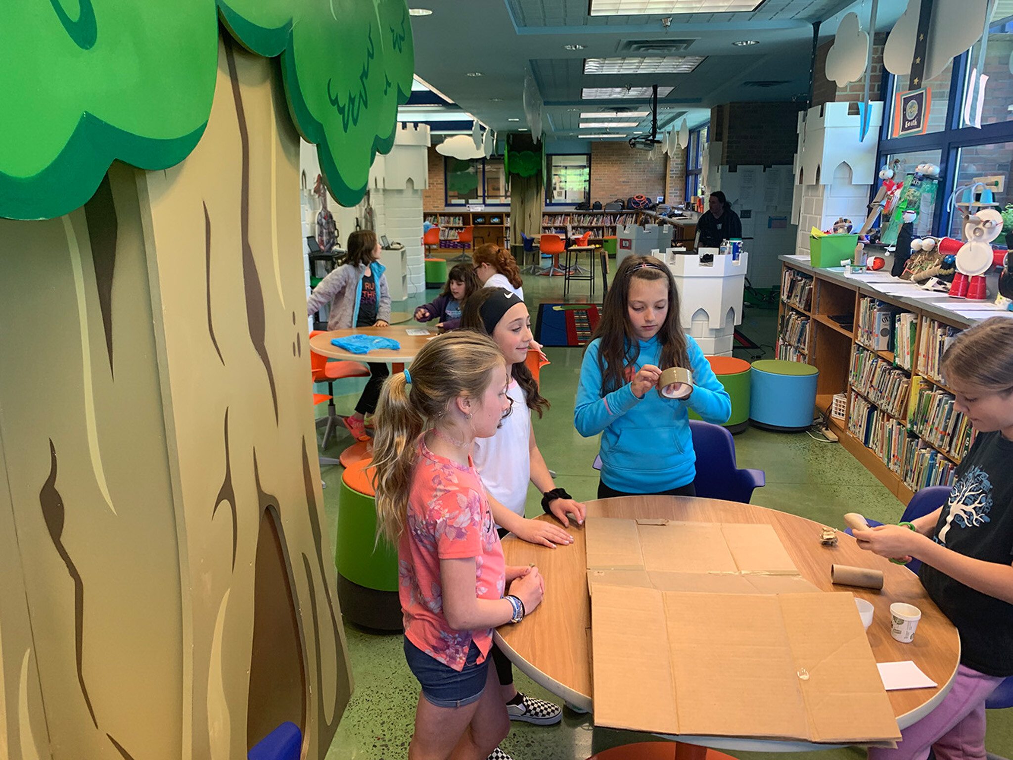 students collaborating on a project at school